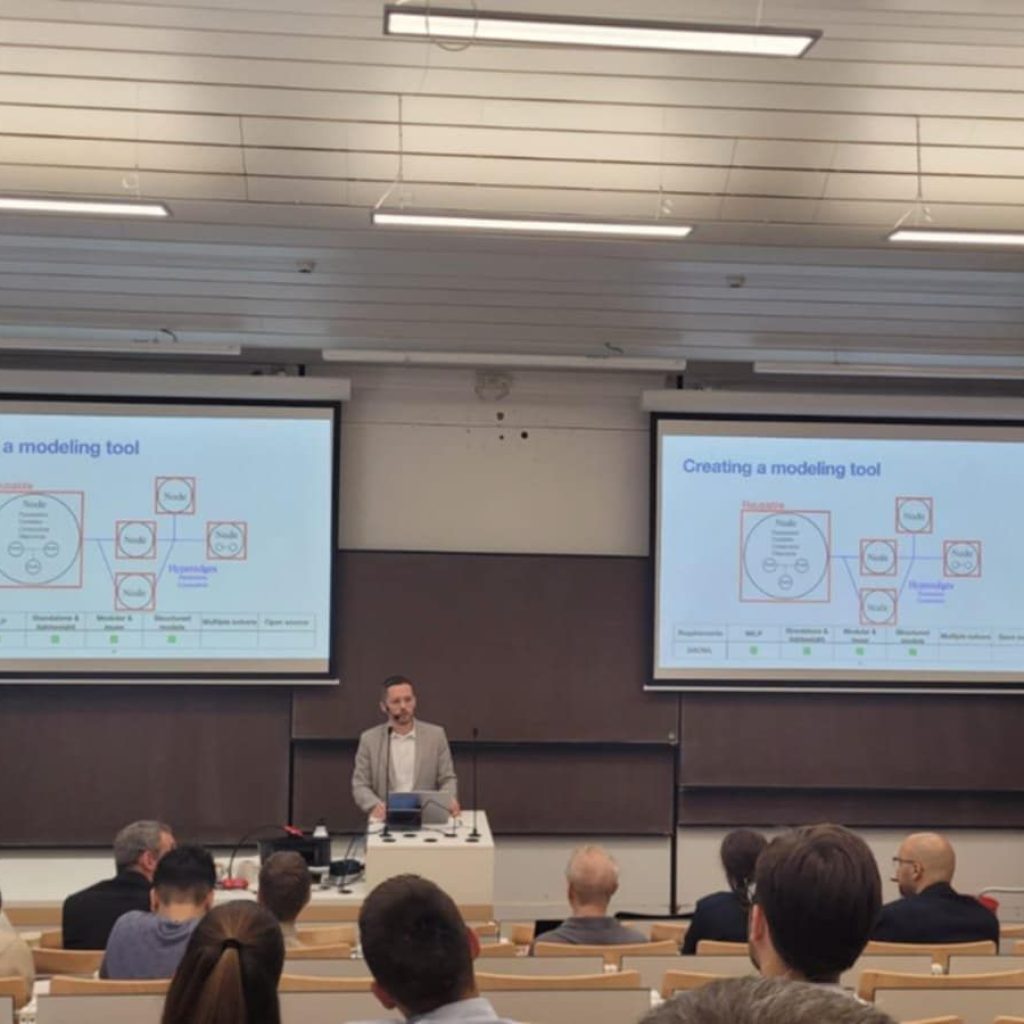 Dr. Bardhyl Miftari presenting optimization modeling tools